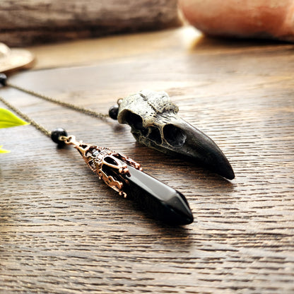 Pendule Crâne de corbeau en Obsidienne noire