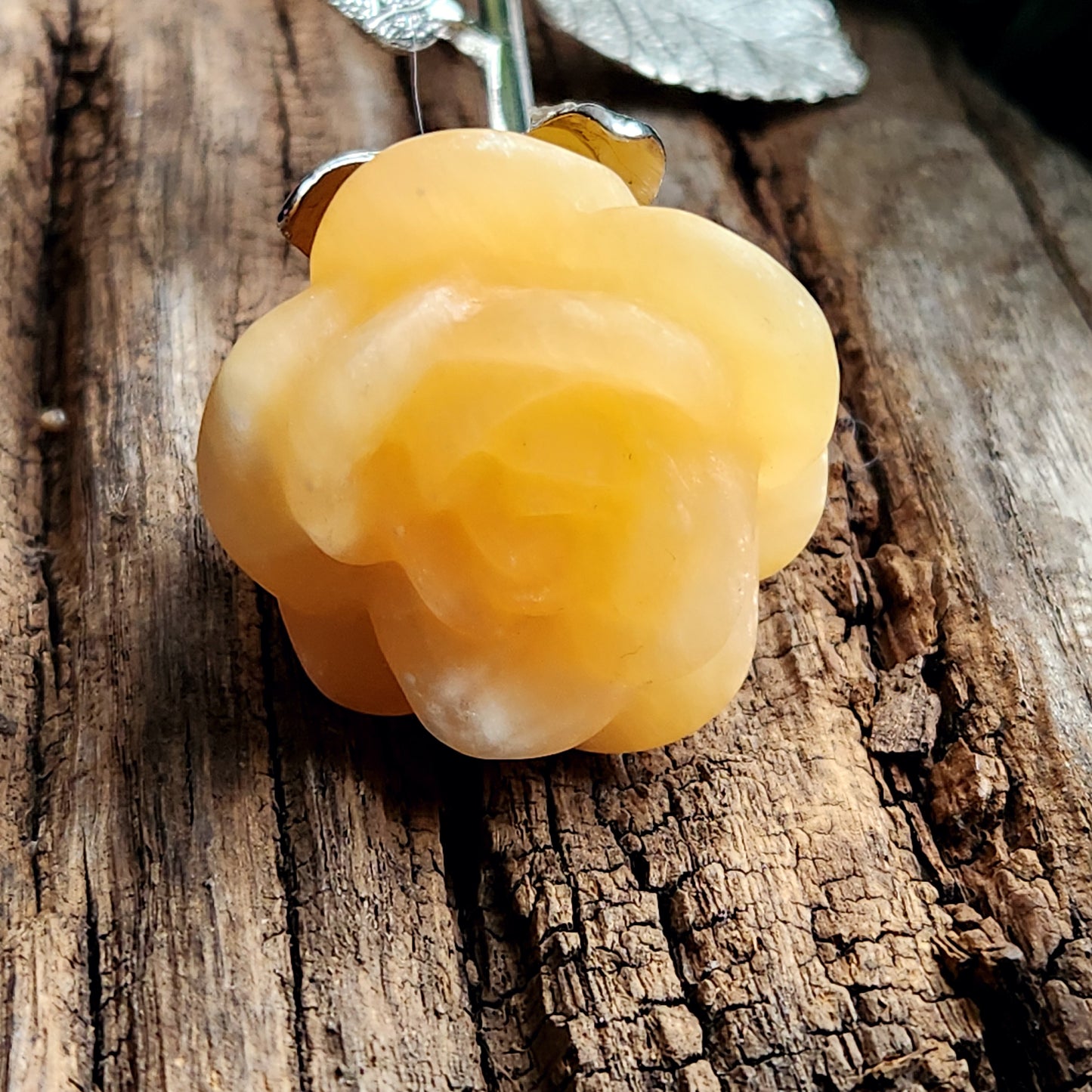 Rose en Calcite orange - tige argentée